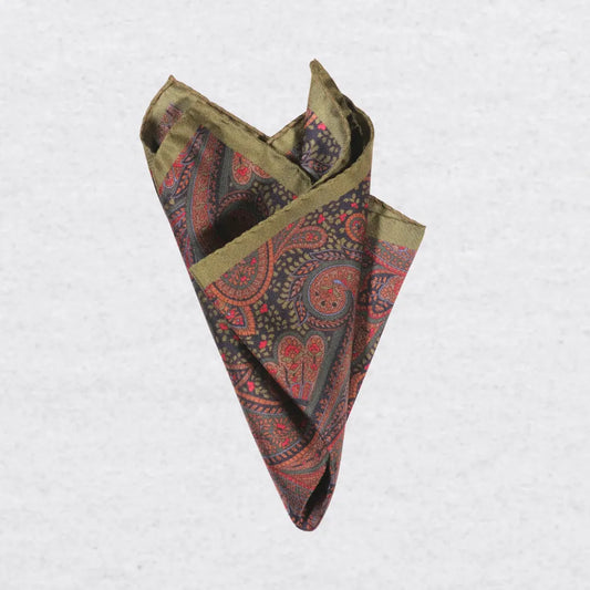 Monti Castello silk pocket square, olive cinnamon paisley, pinched fold