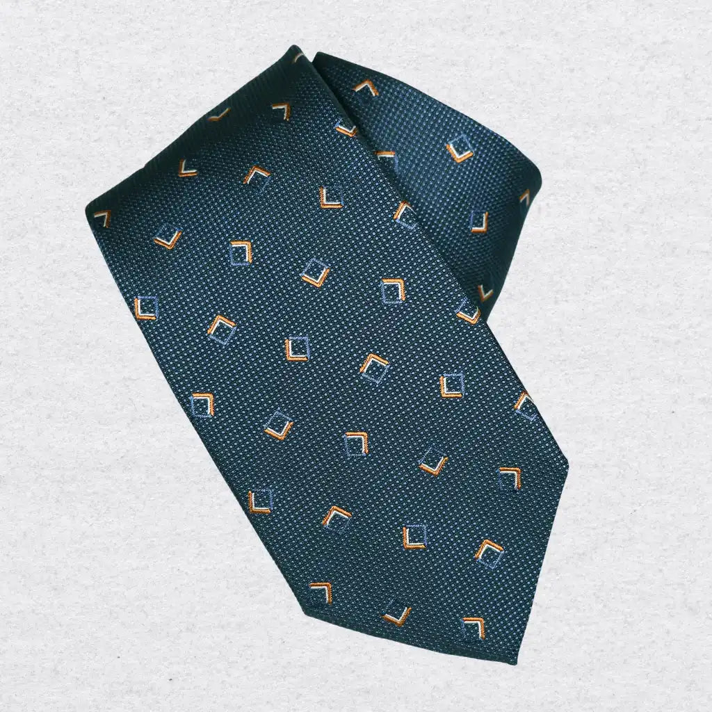 Navy silk necktie with geometric pattern on a white background