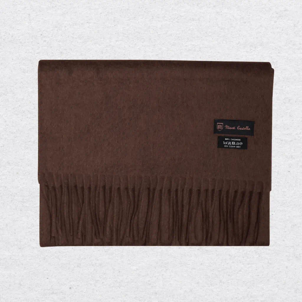 Chocolate brown scarf with a Monti Castello label on a light gray background