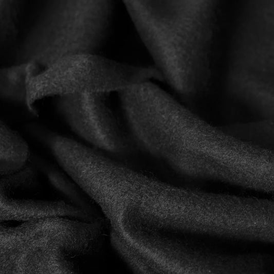 Close up of black cashmere scarf fabric