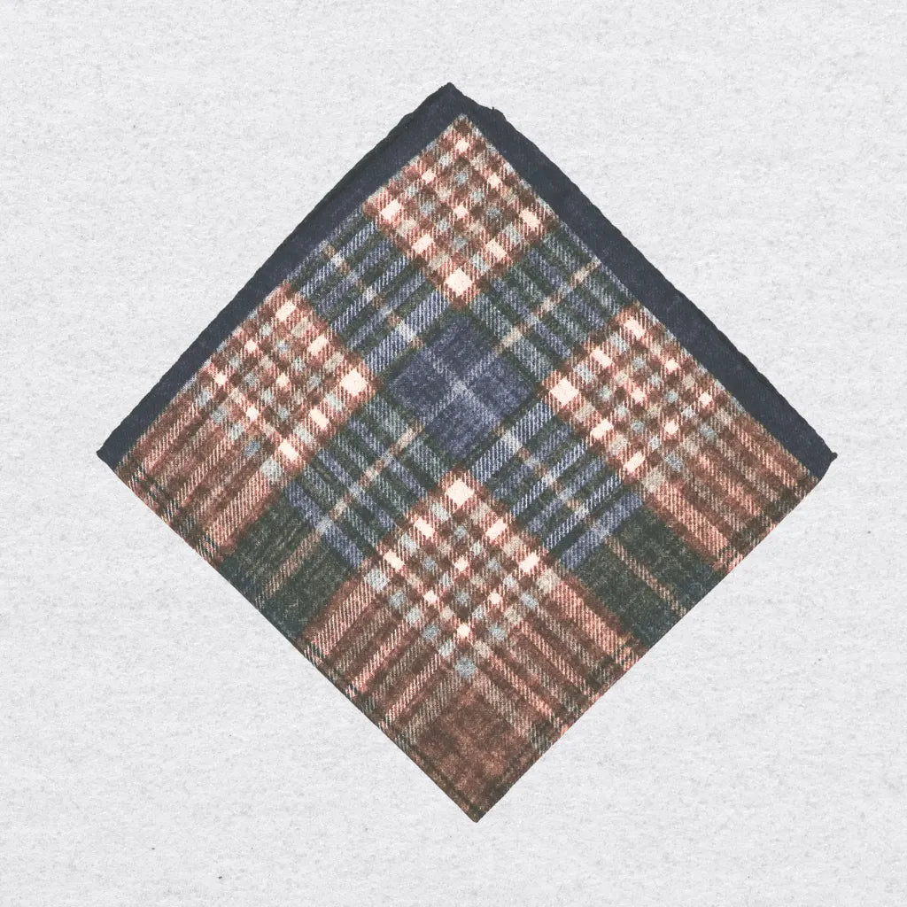 Check wool-silk pocket square with blue and brown colors folded into a square