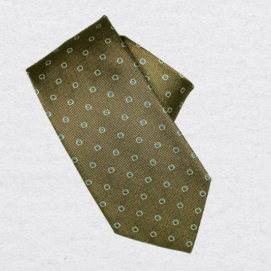Bronze silk tie with small teal design, rolled on a white background