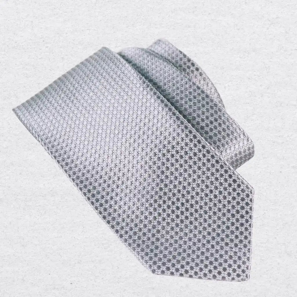 Silver silk tie with a dotted texture, made in Italy 