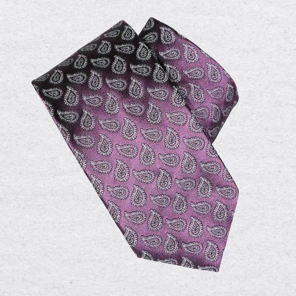 Purple paisley tie on a white background