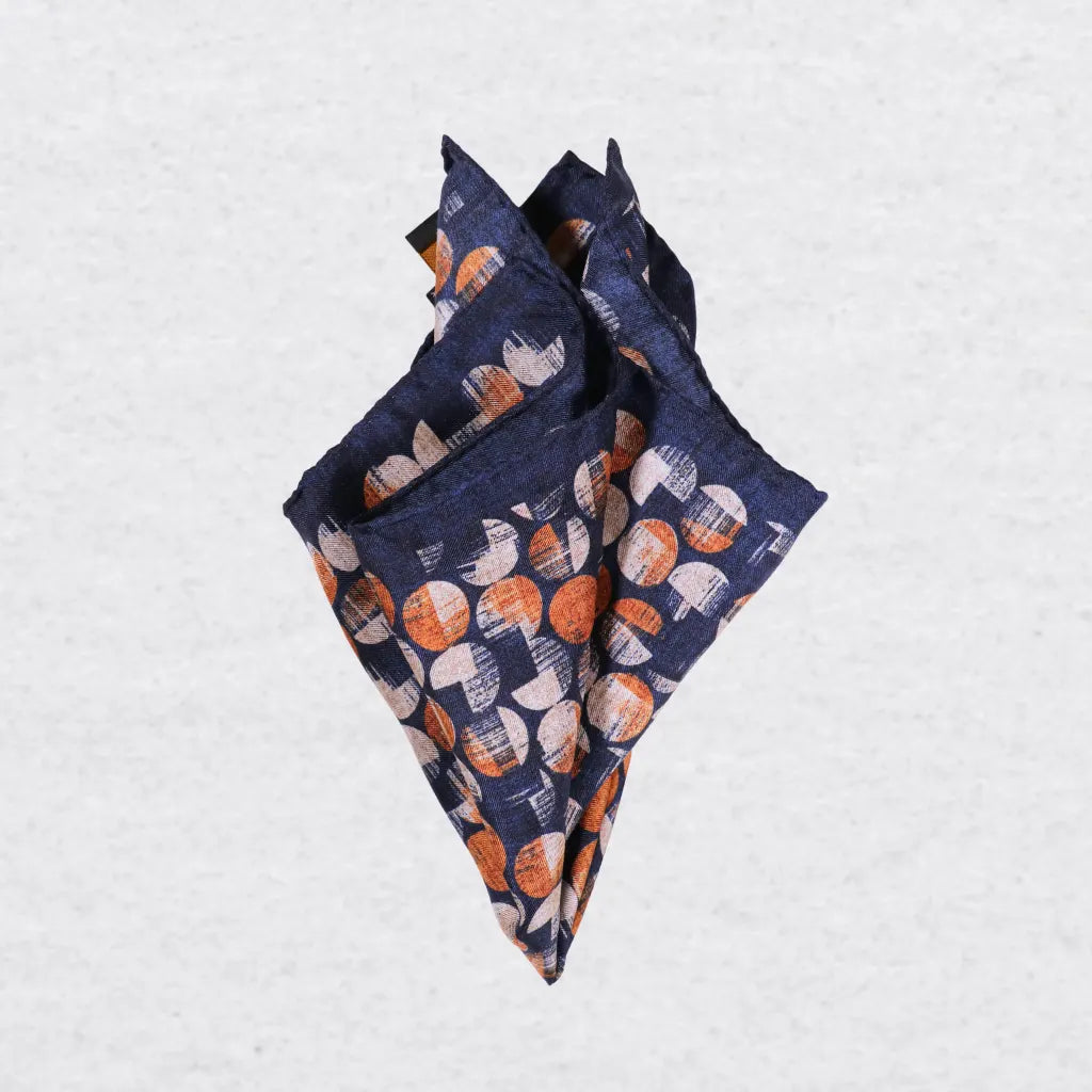 Monti Castello silk pocket square, navy terracotta bubble design, pinched fold