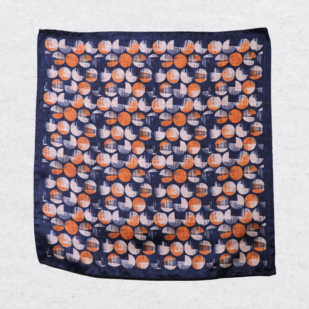 Monti Castello silk pocket square, navy terracotta bubble design, flat lay