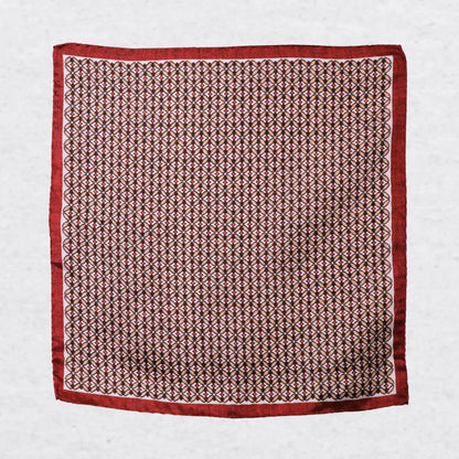 Monti Castello silk pocket square, burnt orange camel geometric, flat lay
