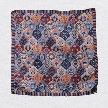 Monti Castello silk pocket square, playful patchwork, flat lay