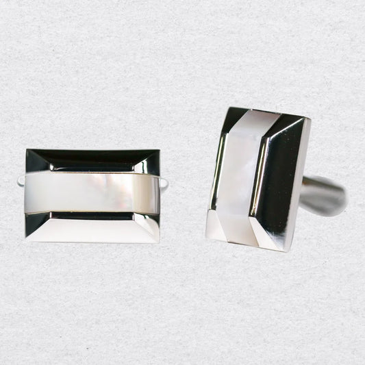 Pair of cufflinks shaped like pyramids with a mother of pearl stripe through the centre of a silver setting
