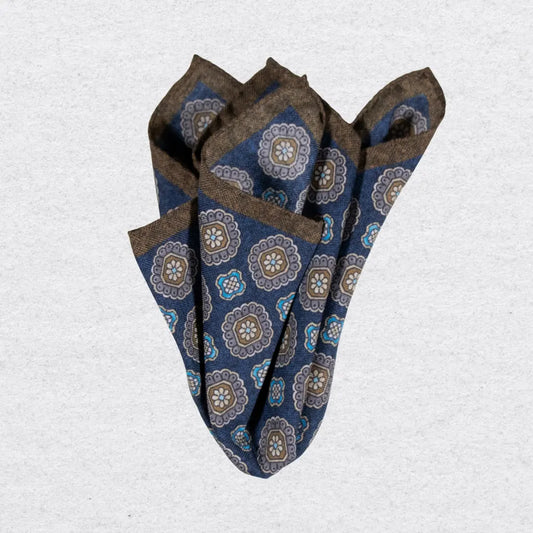 Dark blue wool-silk pocket square with a brown trim and coloured medallions