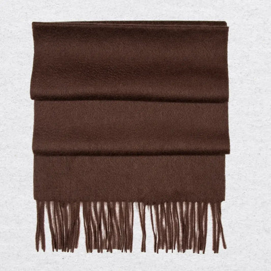 Brown cashmere scarf with tassels on a light gray background